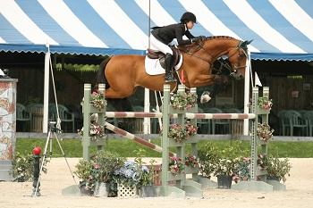 Danielle Torano and Capitano won the ,000 Show Jumping Hall of Fame High Junior/Amateur-Owner Classic July 21 at the Vermont Summer Festival in East Dorset, VT. Photo by David Mullinix Photography