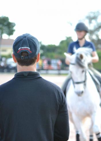 Robert Dover coaching young rider talent at the Robert Dover Horsemanship "Mega" clinic held Dec 26-31, 2011 in Wellington Florida. (Photo: Jennifer Keeler)