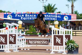 Emanuel Andrade of Venezuela claimed the High Junior Jumper Championship title with Carboni on opening week of the FTI Consulting Winter Equestrian Festival in Wellington, Florida. Photo by Jack Mancini