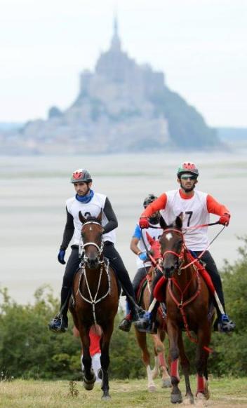  Winners HE Sheikh Hamdan bin Mohammed Al Maktoum (left) and Nikos, with HE Sheikh Rashid Dalmook Al Maktoum and Yamamah pictured in front of the iconic Mont Saint-Michel at today’s Endurance test event for the Alltech FEI World Equestrian Games™ in Normandy 2014. (Photo: Philippe Millereau KMSP)