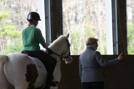Cecily Byrd, age 12, followed Gerritsen's direction on preparing her horse, Merlin, before transitions.
