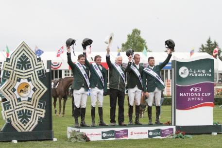  Team Ireland on the podium after their convincing victory in the third and last leg of the Furusiyya FEI Nations Cup™ Jumping North America, Central America and Caribbean League at Spruce Meadows in Calgary, Canada.  L to R - Shane Sweetnam, Darragh Kenny, Chef d’Equipe Robert Splaine, Richie Moloney and Conor Swail.  Photo: FEI/Jennifer Wood Media.