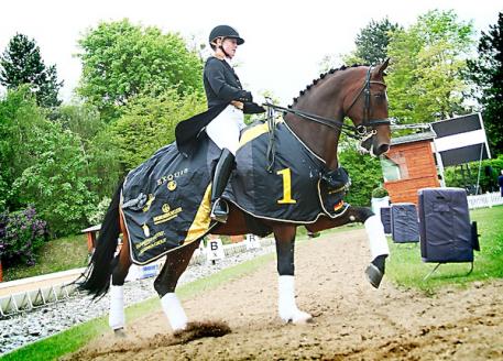 Champion Germany's Isabell Werth and El Santo