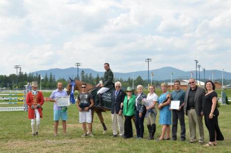 Jeff Welles is honored for winning the ,000 Devoucoux Grand Prix on Prem Dollar Boy. (c) The Book LLC