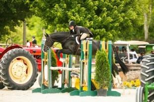 Jennifer Bliss and Sugarman, pictured competing in the &dollar;5,000 NEHJA Hunter Derby, were division champions in the Pre-Green Hunter 3&rsquo;3&rdquo; division during World Championship Hunter Rider (WCHR) competition at the Vermont Summer Festival in East Dorset, VT. Photograph by David Mullinix Photography