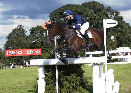 Jock Paget (NZL) and Clifton Promise clear the HSBC Maltings Branch fence to take the lead after Cross Country at the Land Rover Burghley Horse Trials (GBR). Paget is also second on Clifton Lush. (Photo: Kit Houghton/FEI).