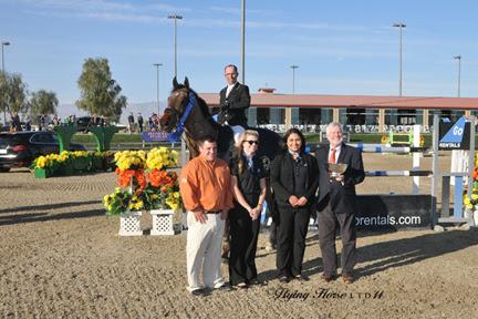  Tony Hitchcock and Chris Mayone of HITS are joined with Go Rentals representatives Karla Zapata and Chrissie Riley to present John Pearce and Son of a Gun with top honors, including a Horze Equestrian cooler, after the ,000 Go Rentals Grand Prix, presented by Zoetis, at HITS Thermal. ©Flying Horse Photography