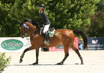 Amanda Flint and Superbad celebrate their first career grand prix victory at the Vermont Summer Festival. Photo by David Mullinix Photography