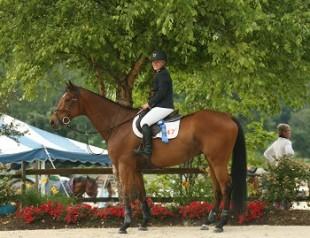 Kathryn Callaghan and Gentle Red celebrate their win in the &dollar;1,500 Marshall &amp; Sterling Children's Jumper Classic on July 27 at the six-week Vermont Summer Festival. Photo by David Mullinix Photography