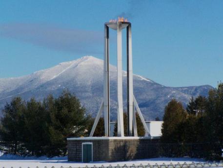 The 1980 Olympic torch is located next to the Horse Show's stabling tents. ©Sue Cameron