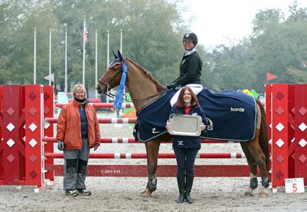  Top honors, including a Horze Equestrian cooler, are presented to Lisa Goldman and Centurion B after they won the ,000 SmartPak Grand Prix, presented by Zoetis, at HITS Ocala. ©ESI Photography