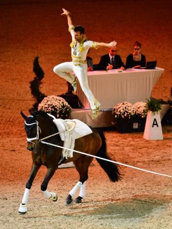 Lukas Klouda (CZE) on Danny Boy lunged by his coach and former World and European champion Patric Looser, secured the male individual competition at the opening qualifier of the FEI World Cup™ Vaulting 2013/2014 series in Munich. (Photo: Daniel Kaiser/FEI).