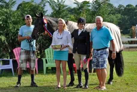 President of Classic Company, Bob Bell and Awards Coordinator Robin McPhearson, present Lynn Seithel and Versace the James Vaughn Perpetual Trophy. Flashpoint Photography