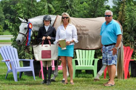 Madison Maners and her own Blue Steel were awarded the Rave Perpetual Trophy and the Grand Large Junior Hunter Championship by Classic Company President, Bob Bell and Awards Coordinator Robin McPhearson. Flashpoint Photography
