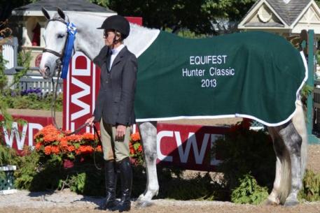 Margaret O'Meara and Voice of Reason claimed the blue in the ,000 Amateur Owner Classic at Equifest II.  Photo Credit: Brenda Mueller.
