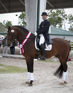 Colombian dressage rider Marco Bernal and Farewell IV were reserve champions in the Prix St. Georges class at the Wellington Classic Dressage Spring Challenge CDI. Bernal is sponsored by the National Colombian Coffee Federation, and proudly shows in a saddle pad featuring the federation’s logo. (Photo courtesy of Sharon Packer)
