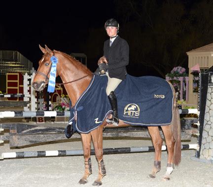 Michael Hughes accepts top honors in the HITS Equitation Championship. ©ESI Photography