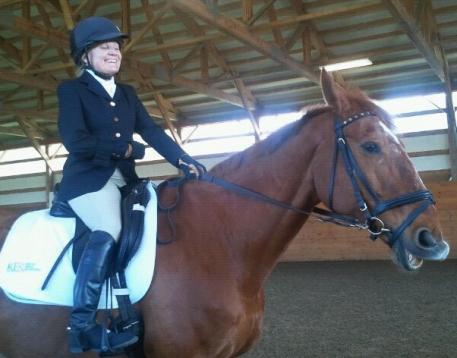 Lara Oles shares a laugh with Rainman after demonstrating a Grade 3 test for the Trainers' session.