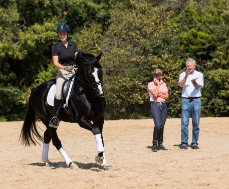 Christoph Hess and Linda Parelli schooling Emily Wagner aboard the 6-year-old AWR stallion WakeUp