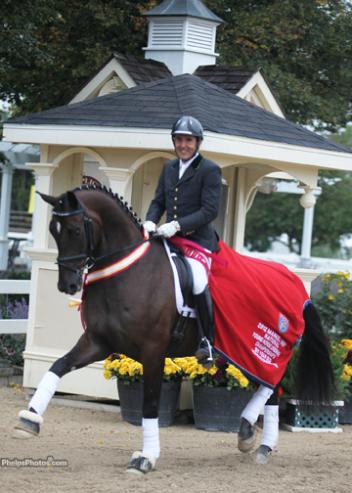 Cesar Parra (White House Station, NJ) and Michael Davis' Simply Nymphenburg (Sir Donnerhall I-Wendy by Weltmeyer) nailed the Siv-Year-Old Reserve Championship