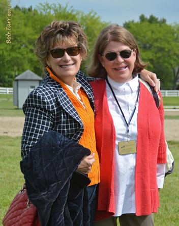 The always fashionable and travel ready Dressage Judges Janet Foy and Lois Yukens enjoy a moment "out of the box" at the 2013 Kentucky Dressage Association Spring CDI Photo: BobTarr.com