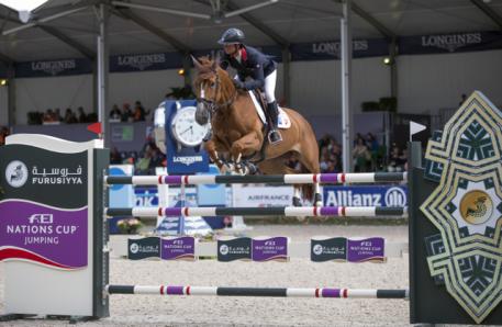 Penelope Leprevost and Flora de Mariposa sealed victory for France today in a two-way jump-off against the clock at the Furusiyya FEI Nations Cup™ Jumping 2014 Europe Division 1 leg in Rotterdam, The Netherlands.  Photo: FEI/Dirk Caremans.