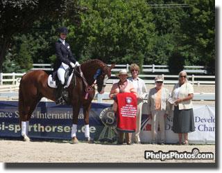 Caroline Roffman and Pie in the winner's circle for the Reserve Championsip in the Developing Horse division spnsored by J. Tim Dutta and PSI Sales International