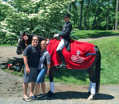 Jeremy and Tracy Roenick with Steffen Peters and their reserve champion mare Apassionata
