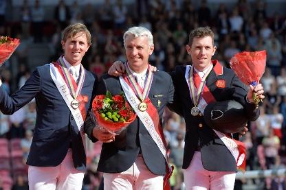 Roger Yves Bost became just the fifth French rider to claim the Individual European title when scorching to victory with the brilliant Castle Forbes Myrtille Paulois in the PSI FEI European Jumping Championship at Herning in Denmark today. Pictured on the podium this evening (L to R): silver medallist Ben Maher (GBR), gold medallist Roger Yves Bost (FRA) and bronze medallist Scott Brash (GBR).