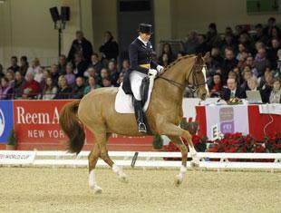 Germany's Ulla Salzgeber and her reliable chestnut Herzruf’s Erbe won the fifth leg of the Reem Acra FEI World Cup™ Dressage series Photo: Stefan Lafrentz/FEI