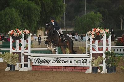 Sarah Peterson pulls out a surprise victory in the CPHA Child-Adult Medal Final. Photo: Flying Horse Photography