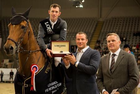 Great Britain’s Scott Brash and Hello Sanctos won the opening leg of the Longines FEI World Cup™ Jumping Western European League at Oslo, Norway today.  They are pictured at the prize presentation with Longines ambassador Aksel Lund Svindal and Morten Thormodsen. Brand Manager and Sales Representative for Longines, Norway. Photo: FEI/Roger Svalsroed.
