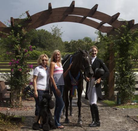 ShowChic’s Michele Hundt, Arlo the poodle, and Krystalanne Shingler with Caroline Roffman and her mount, Her Highness O during the ShowChic commercial shoot. (Photo: courtesy of Sim Gottesman)