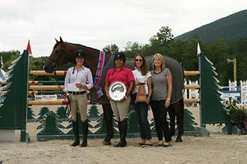 Thea Chafee is presented as the winner of the fourth annual Adirondack-Green Mountain Challenge. From left to right: Thea Chafee with INXS, Shachine Belle, Adele Einhorn, and Robin Swinderman. Photo by David Mullinix Photography