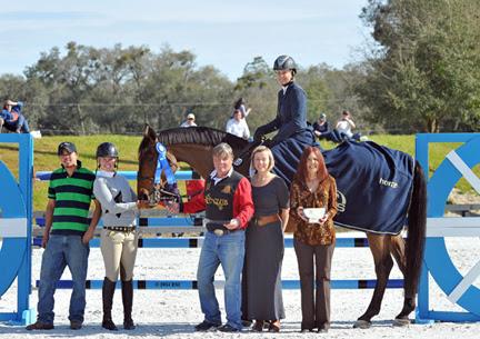 Tracy Fenney and MTM Centano are presented with top honors, including a Horze Equestrian cooler, after them won the ,000 HITS Grand Prix, presented by Zoetis, at HITS Ocala. ©ESI Photography