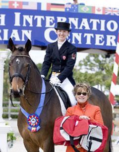 Belinda Trussel and Anton accepting first place in the CDI Grand Prix from judge Janet FoyCredit: susanjstickle.com