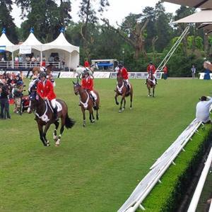 The U.S. celebrates their second place finish during the victory gallop (USEF Archive)