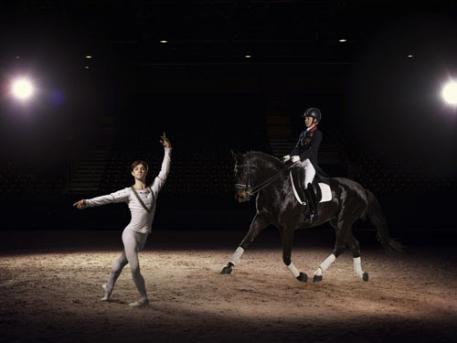 Olympic and European Dressage champion Charlotte Dujardin OBE demonstrates the grace and harmony of her sport, alongside Kanstantsin Geronik from the Minsk Bolshoi ballet, ahead of the Reem Acra FEI World Cup™ Dressage Final in Lyon, France (17-21 April). (Photo: (c) FEI/Hamish Brown)