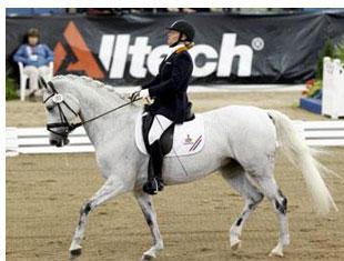 Sophie Wells taking the individual gold in grade IV Picture Kit Houghton FEI