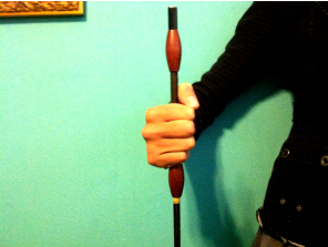 You should be able to rotate your wrist without the use of your elbow. Your elbow is busy following the movement of the horse!