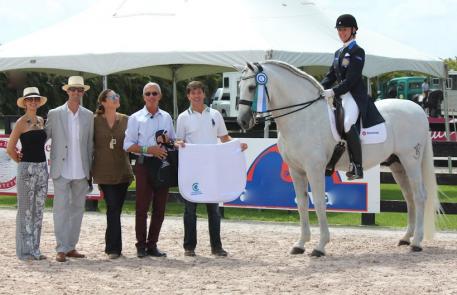Lourdes Ariza and Naval Banamex accept the Choice of Champions Performance Award during the 12th week of the Adequan Global Dressage Festival