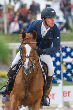 Happy Z and Wilhelm Genn clearing their final grand prix fence.