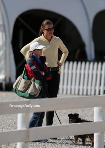 Olympian Debbie McDonald and Adrienne Lyle look on while working student Taylor Yamamoto take center stage at the Kentucky Horse Park. Photo: Mary Phelps