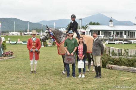 Adrienne Iverson and Chapman ET receive their awards (Photo: The Book LLC)
