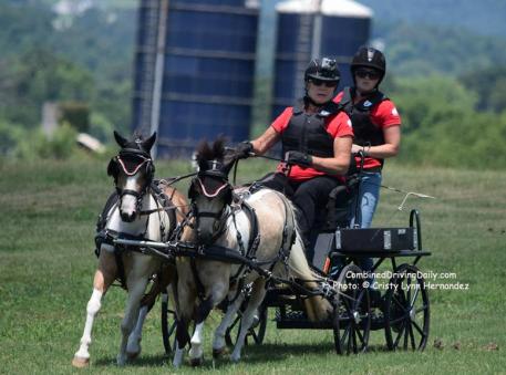 Al Capony shows Kimba the ropes along with driver Mary Phelps and navigator Kate McIntyre Photo: Cristy Lynn Hernandez