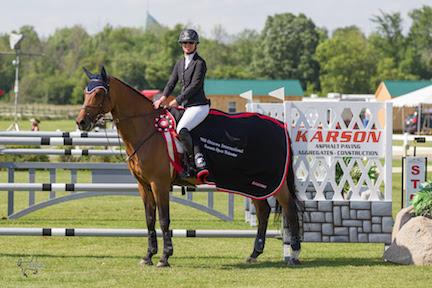 Amy Millar and Heros, owned by AMMO Investments, are presented as the winners of the 0,000 Karson Open Welcome. (Photo: Ben Radvanyi Photography)