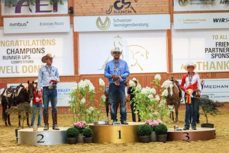 The individual podium at the 2016 SVAG FEI European Reining Championships for Seniors – Gennaro Lendi (ITA) in gold, Grischa Ludwig (GER) in silver and Tina Kuenstner-Mantl (AUT) in bronze (FEI/ Andreas Kost)