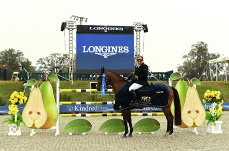 Aaron Vale and Quality on Top winning the $41,200 HITS Jumper Classic. 