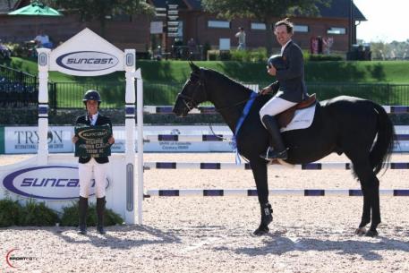 Andy Kocher and Zantos II in their presentation ceremony with Lauren Tisbo of Suncast®.  