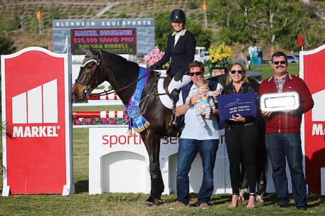 Brenda Riddell celebrates the win with her family, and Melissa Brandes  of Blenheim EquiSports and Markel Insurance's Brandon Seger